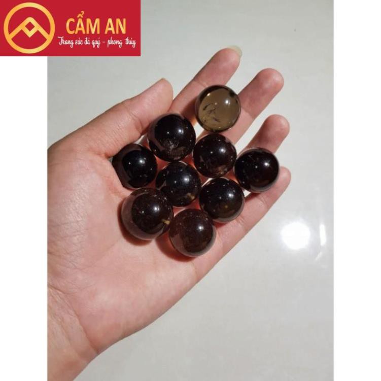 Quả cầu đá thanh tẩy tự nhiên màu vàng khói  kích thước~ 2,5cm nhỏ gọn dễ mang đi.