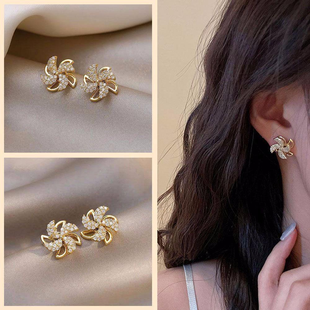 Bông Tai Kim Loại Hình Cối Xay Gió Xoay Được Thiết Kế Đơn Giản Thanh Lịch