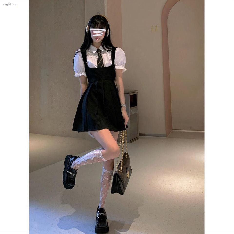 ◐Little black dress strap dress female summer hot girl jk uniform sling pleated skirt + puff sleeve shirt two-piece suit