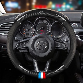 Bọc vô lăng bằng da phối sợi carbon cao cấp cho mazda 3 mazda 5 mazda 6 mazda 2 323 cx7 cx9 cx5 cx3 rx8