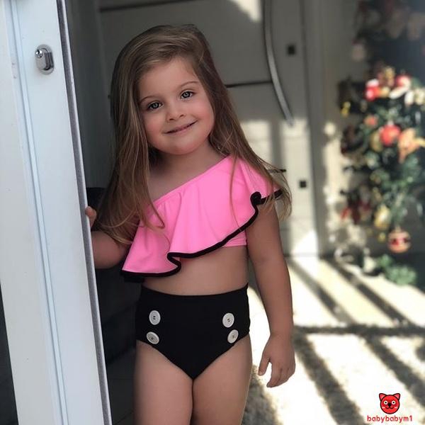 Bộ đồ bơi bikini 2 mảnh gồm áo hở 1 bên vai kèm quần ngắn kéo eo cao xinh xắn dành cho bé gái