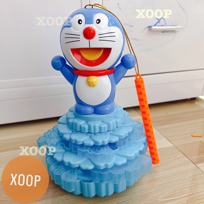 Đồ chơi ! Đô rê mon có nhạc đèn xoay 360 có tay cầm cho bé