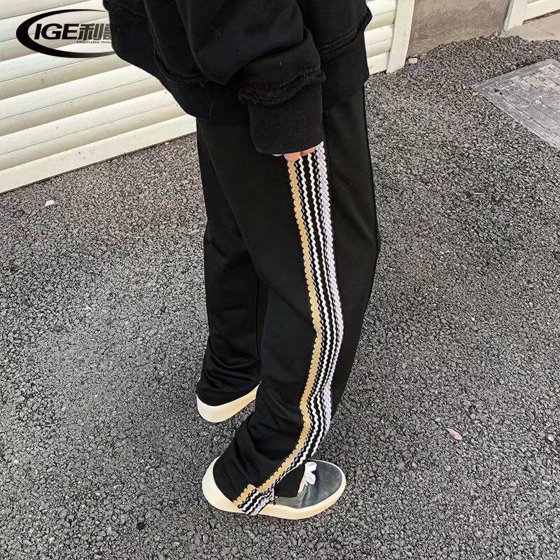Quần dài ống rộng họa tiết kẻ sọc thiết kế xẻ tà phong cách Hàn Quốc thời trang cá tính cho nam