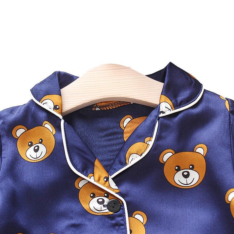 Bộ đồ ngủ ngắn tay in hình gấu dễ thương cho bé