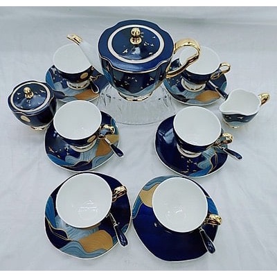 Bộ ấm chén pha trà sứ xương cao cấp kèm 6 đĩa lót 2 tống đường sữa màu xanh hoạ tiết bọt song độc đáo