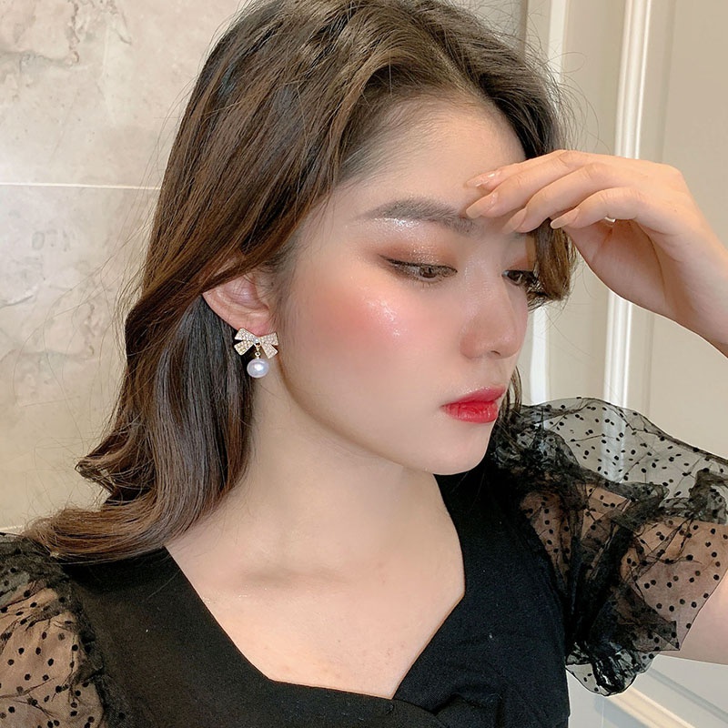 Khuyên tai hình nơ đính ngọc trai kiểu dáng thanh lịch cho nữ