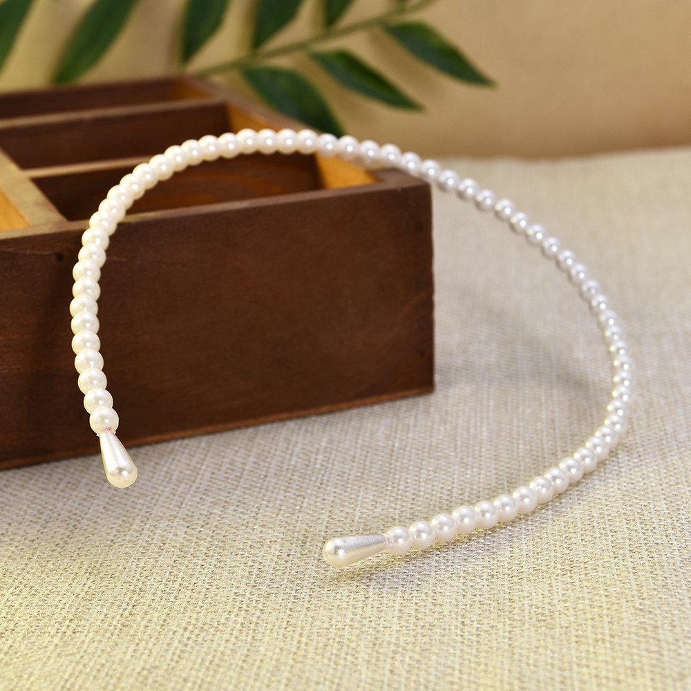 Băng đô đính ngọc trai giả thanh lịch