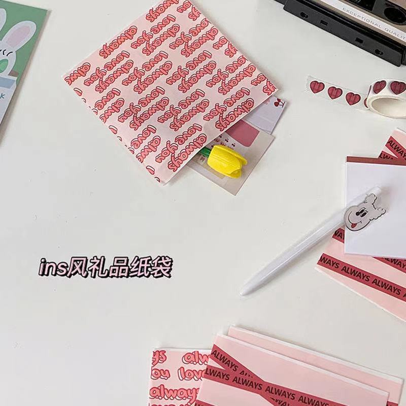 Túi Giấy Đựng Quà Màu Hồng Phối Ruy Băng Dễ Thương