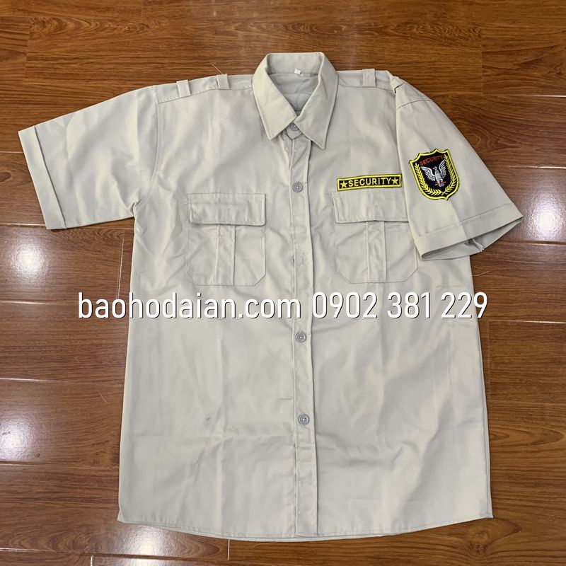 Áo bảo vệ màu kem kèm logo tay ngực vải kaki 65/35 thấm hút mồ hôi