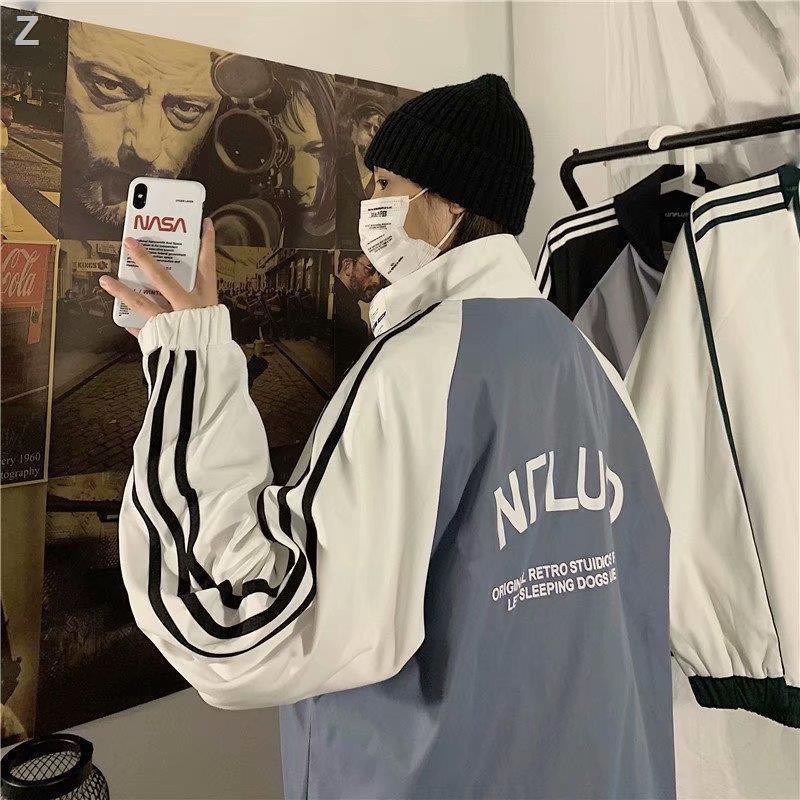 Áo khoác,áo gió 2 lớp form rộng 2 màu thêu logo cổ nam nữ mặc cực chất