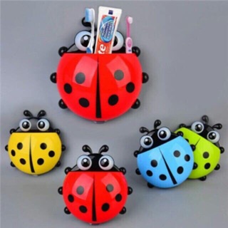 BỌ RÙA VÀ RÙA ĐỰNG BÀN CHẢI VÀ KEM ĐÁNH RĂNG .