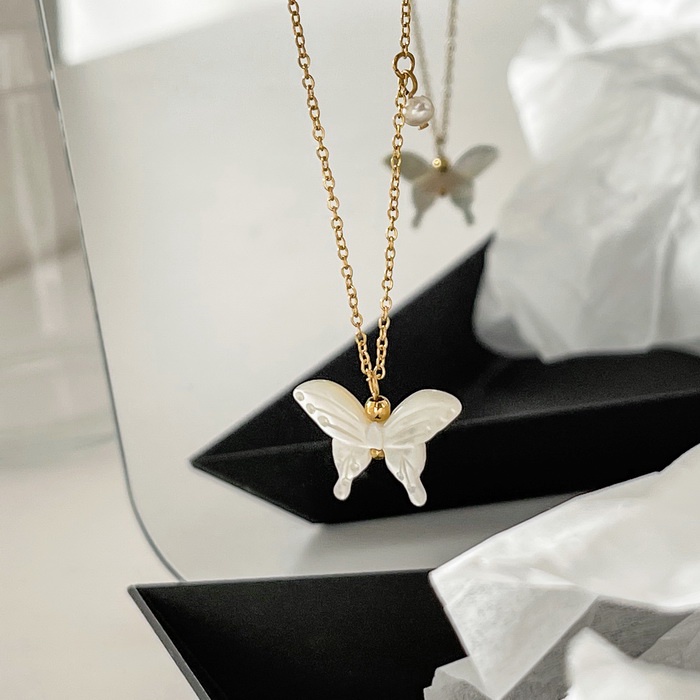 Dây chuyền titan mặt hình bướm vỏ sò trắng phối hạt ngọc vintage không gỉ WN2204