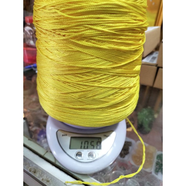 Cuộn dây dù màu vàng siêu to dài 1.200m nặng 1kg làm vòng
