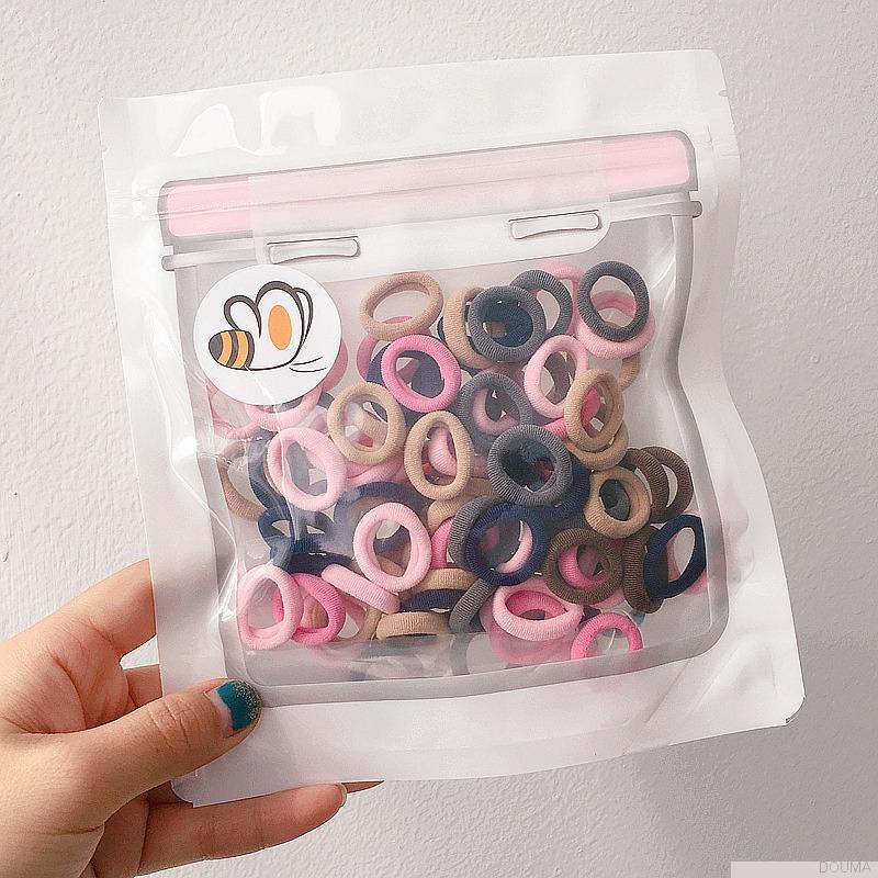 Dây buộc tóc cao su co giãn màu sắc ngọt ngào xinh xắn cho bé gái