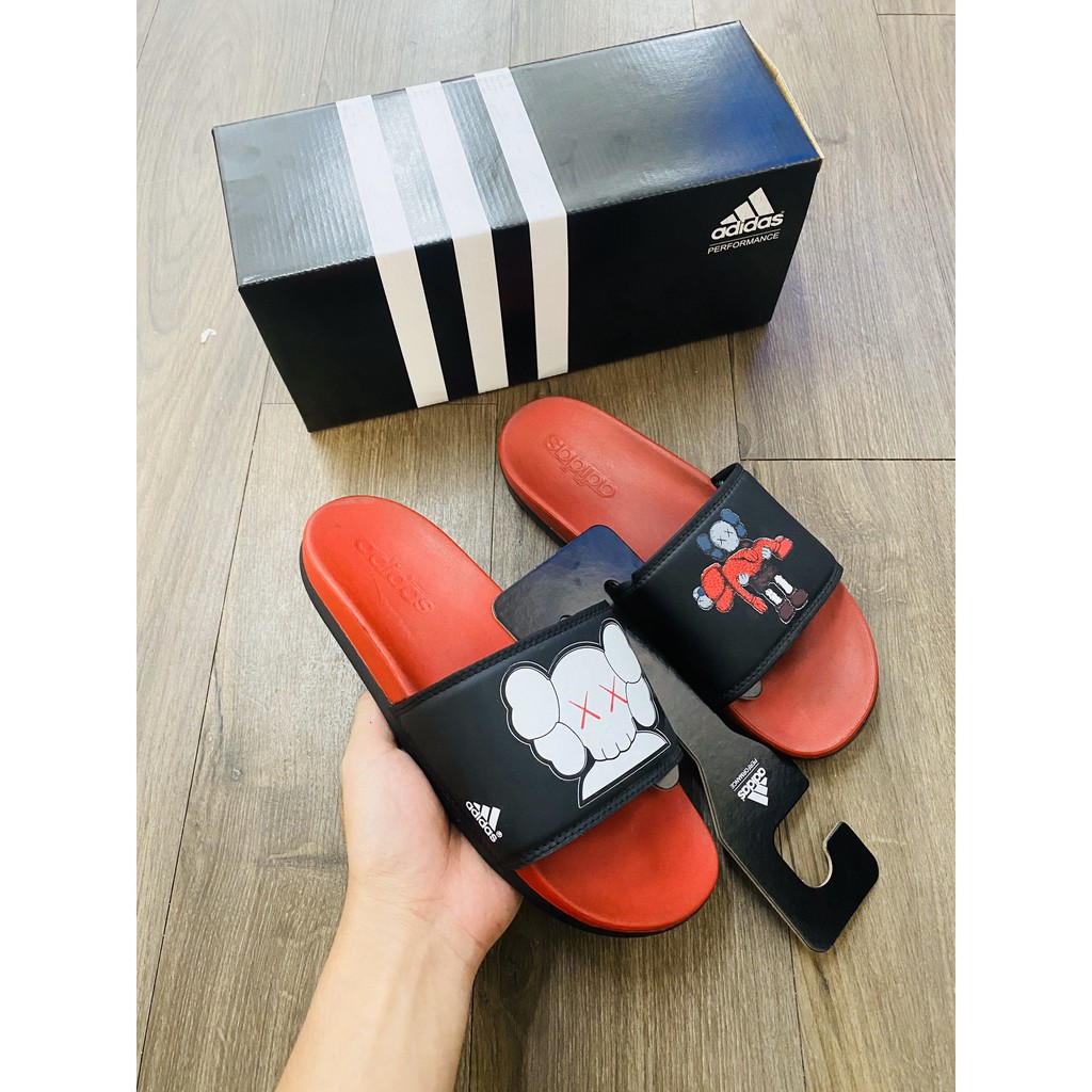 Dép adidas plus nam*kaws đỏ quai đen