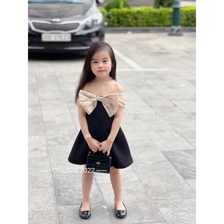 Cặp váy đen nơ bản to bé gái
