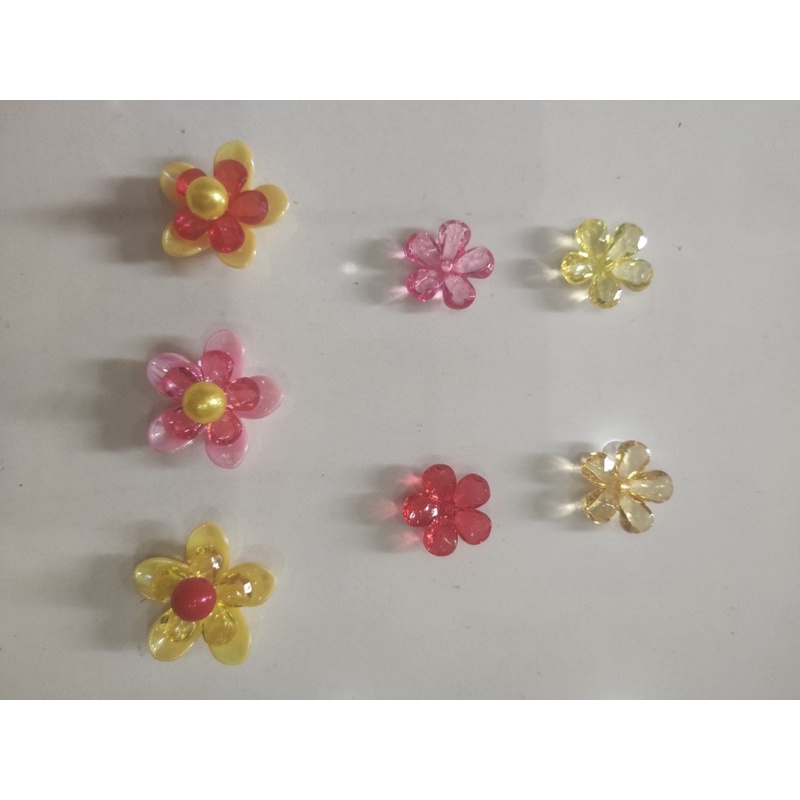 Hoa mai 5 cánh trong ngang 2.2cm.