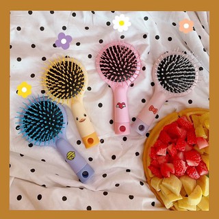 Lược massage kèm gương kute