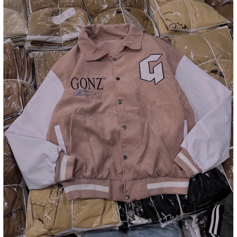 Áo khoác nhung tăm phối tay da lạ mắt in lưng