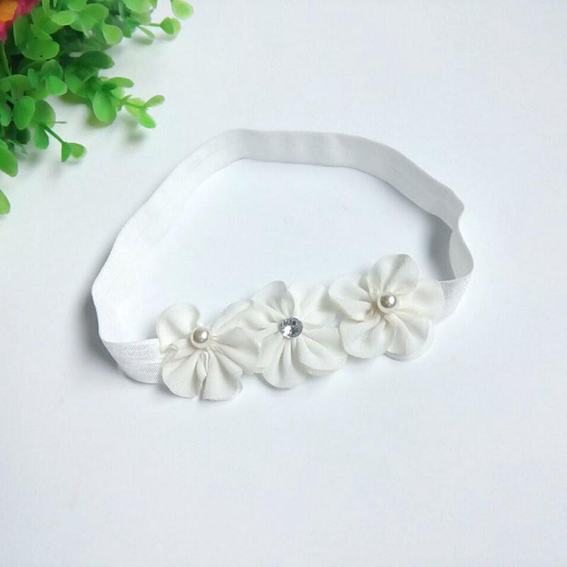 Băng đô đính hoa dành cho bé gái