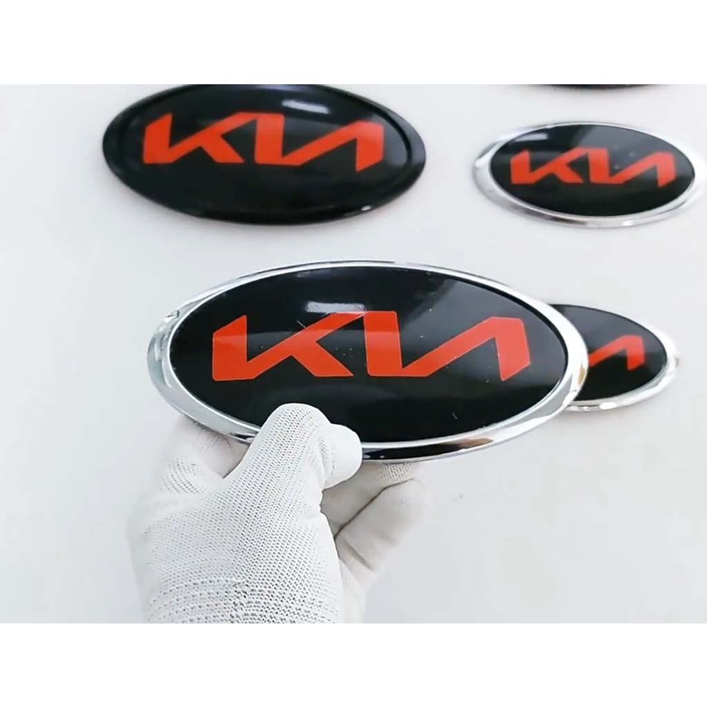 Bộ 2 Logo chính xe Kia Sedona/Carens/Morning