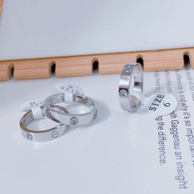 Nhẫn titan cartier đính đá màu trắng