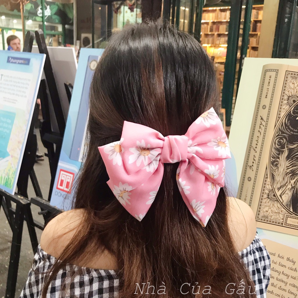 Kẹp tóc nơ hoa cúc dễ thương