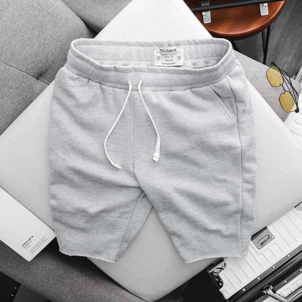 - Quần short nam cắt gấu dài ngang gối