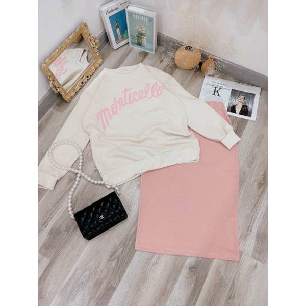 Set áo nỉ kem tay dài kèm chân váy midi hồng có hình thật trải sàn | BigBuy360 - bigbuy360.vn