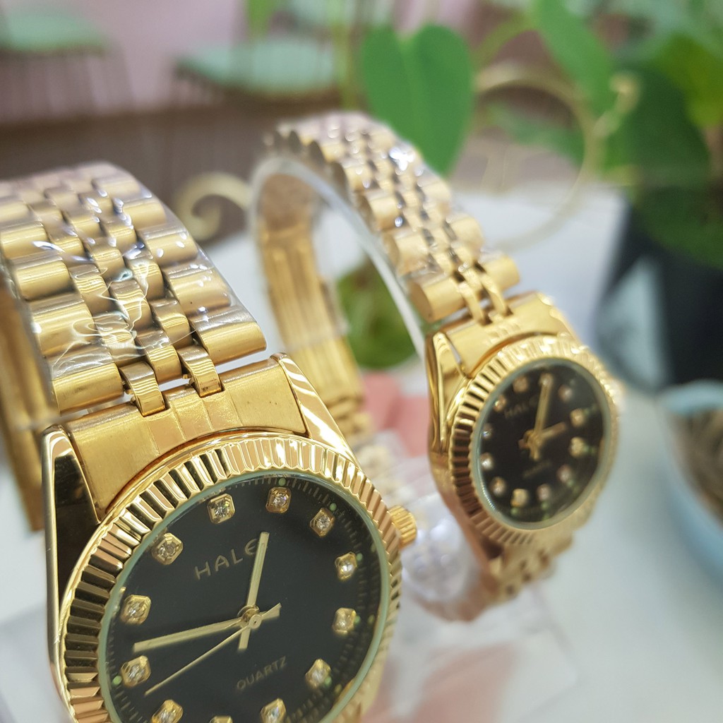 Đồng hồ cặp đôi nam nữ Halei dây thép vàng mặt đen số ngọc chính hãng chống nước 3atm Tony Watch 68