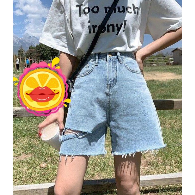 Quần jeans lửng ống rộng rách rối cá tính