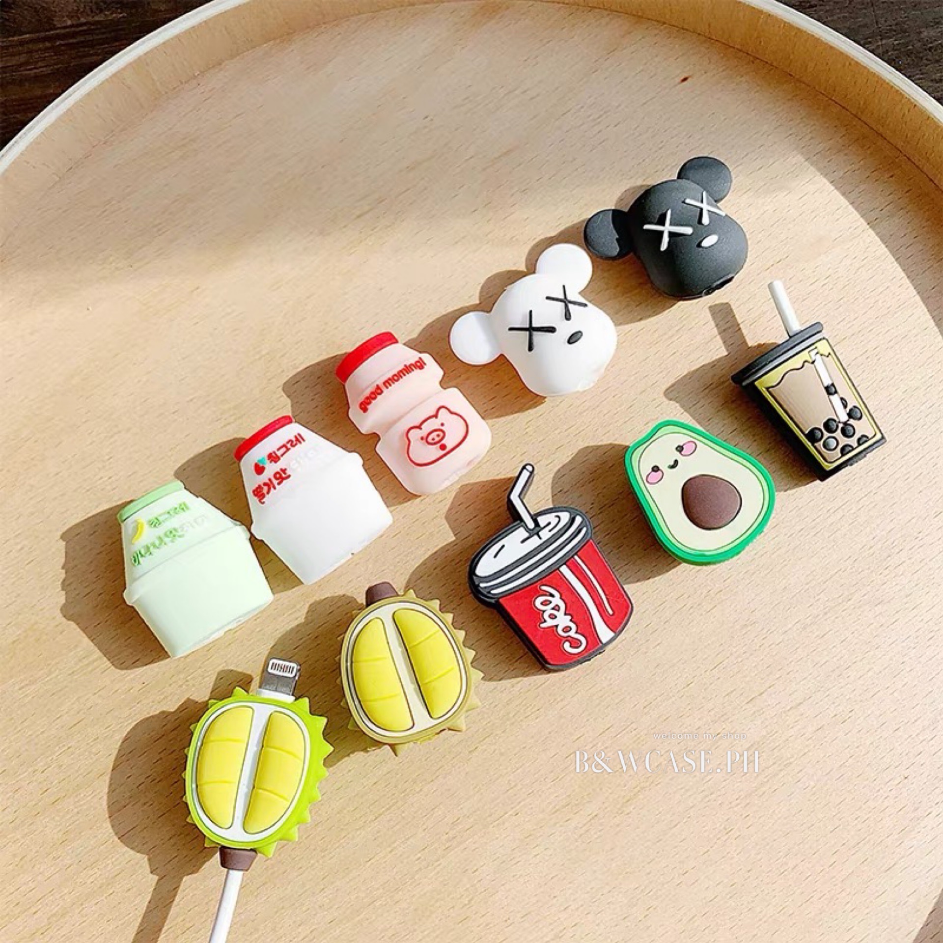 KAWS IPHONE Phụ Kiện Bảo Vệ Dây Cáp Hình Trái Cây Xinh Xắn