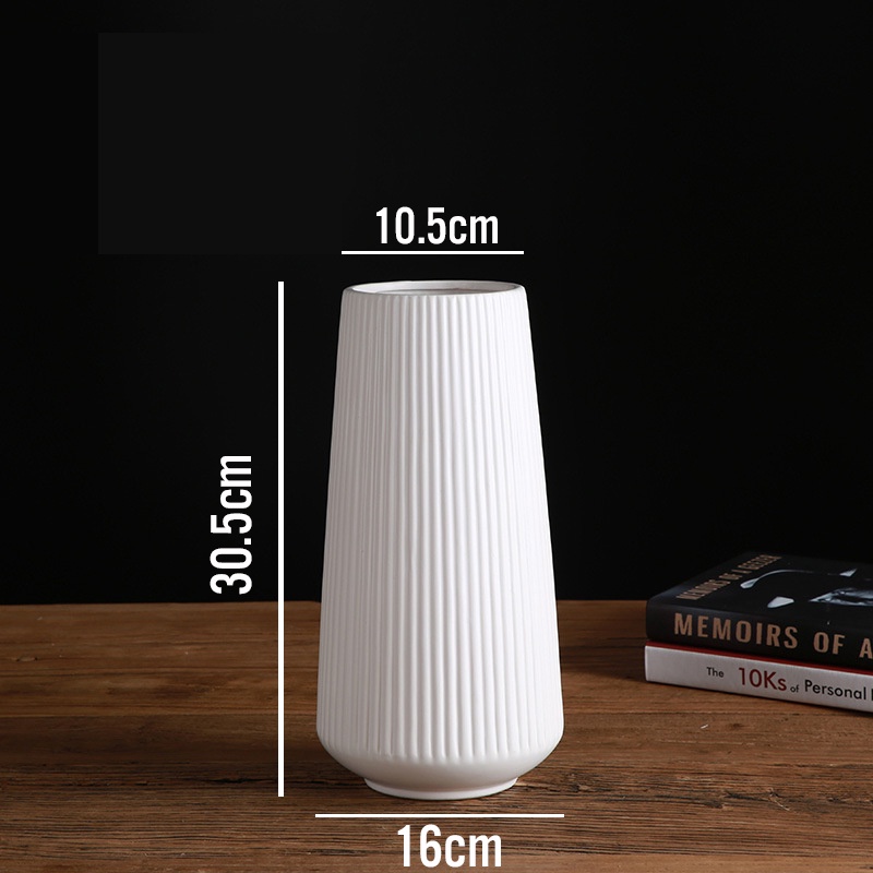 Bình hoa lớn gôm sứ cắm hoa trang trí phòng khách.