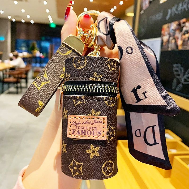 Móc khóa túi trống L.V khóa kéo đựng đồ đẹp sang trọng