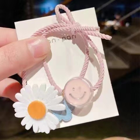 Dây thun buộc tóc đính hoa hướng dương nhỏ cho bé gái