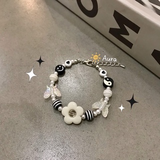 Vòng tay Hoa Trắng đen Handmade thiết kế bởi Aura