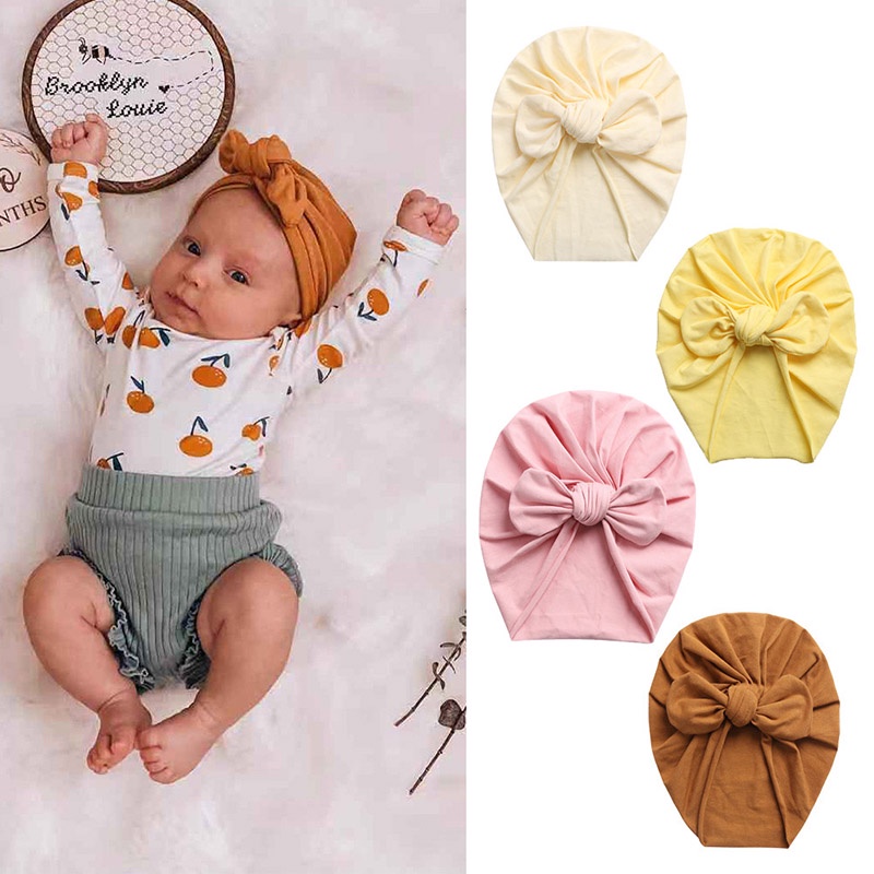 Mũ beanie mềm thắt nơ màu trơn dễ thương cho trẻ em