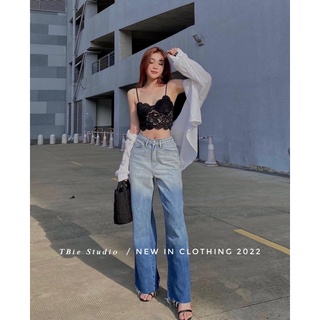 Quần jeans loang rách