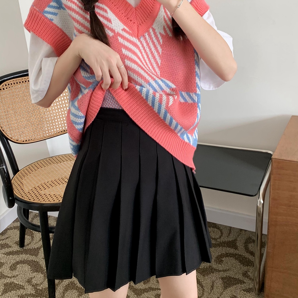 Áo dệt kim sát nách cổ chữ V dáng rộng họa tiết kẻ sọc màu hồng phong cách Hàn Quốc