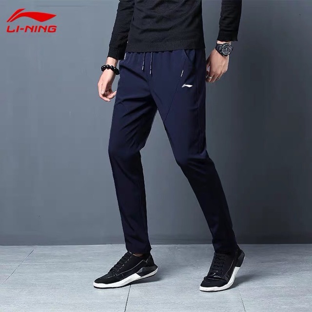 Quần gió lining nam