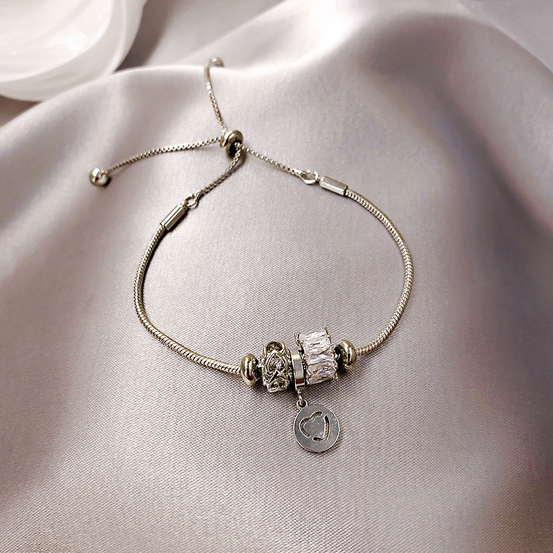 Lắc tay hạt Charm đính đá zircon JUNE có mặt trái tim Vòng tay nữ mặt hạt charm có chốt điều chỉnh kích thước thông minh