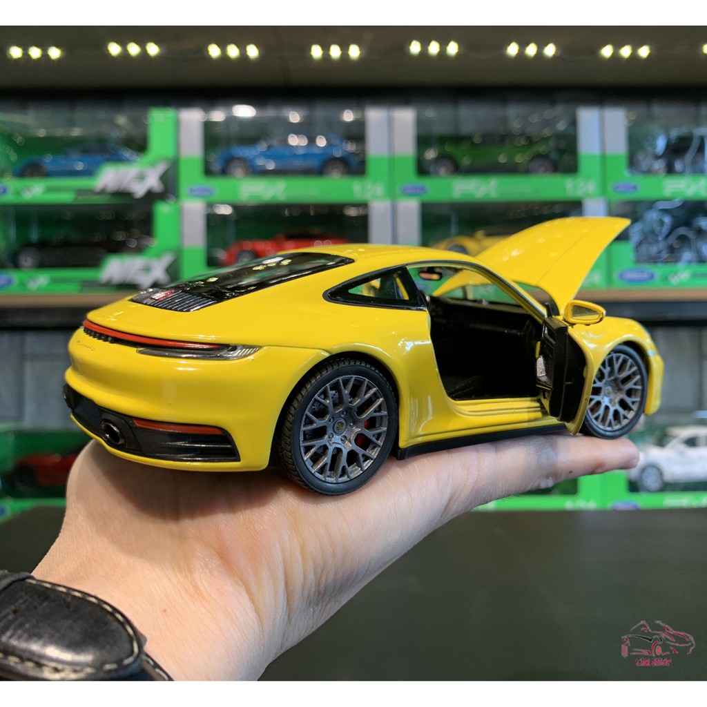 Mô hình xe ô tô Porsche 911 Carrera 4S Hãng Welly tỉ lệ 1:24