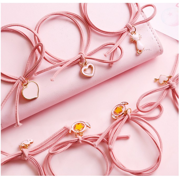 Cột tóc màu hường cực đáng yêu