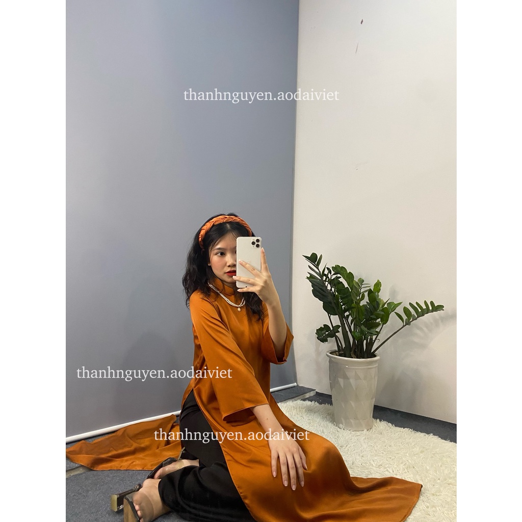 Áo dài cam đất cách tân tay loe lụa Ngọc Trai