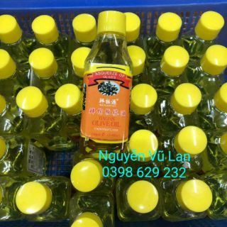 Dầu olive oil dùng lau mực trên da giả trong phun xăm