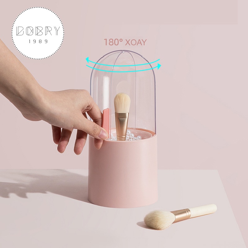 Hộp đựng cọ trang điểm bằng nhựa trong suốt, có nắp xoay 360 độ chống bụi. Tặng kèm túi ngọc trai