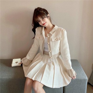 Áo sơmi kiêu phối nút