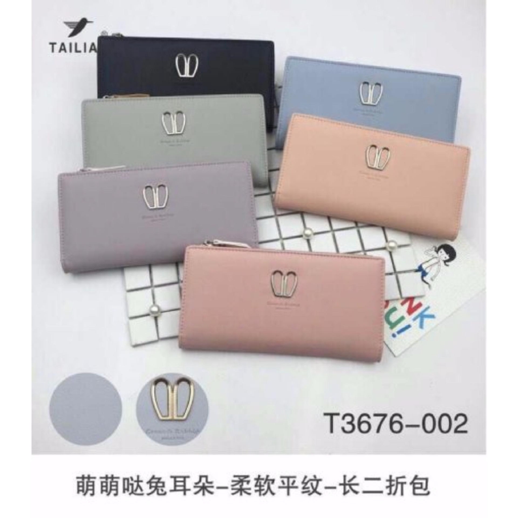 Ví cầm tay nữ thời trang  QC