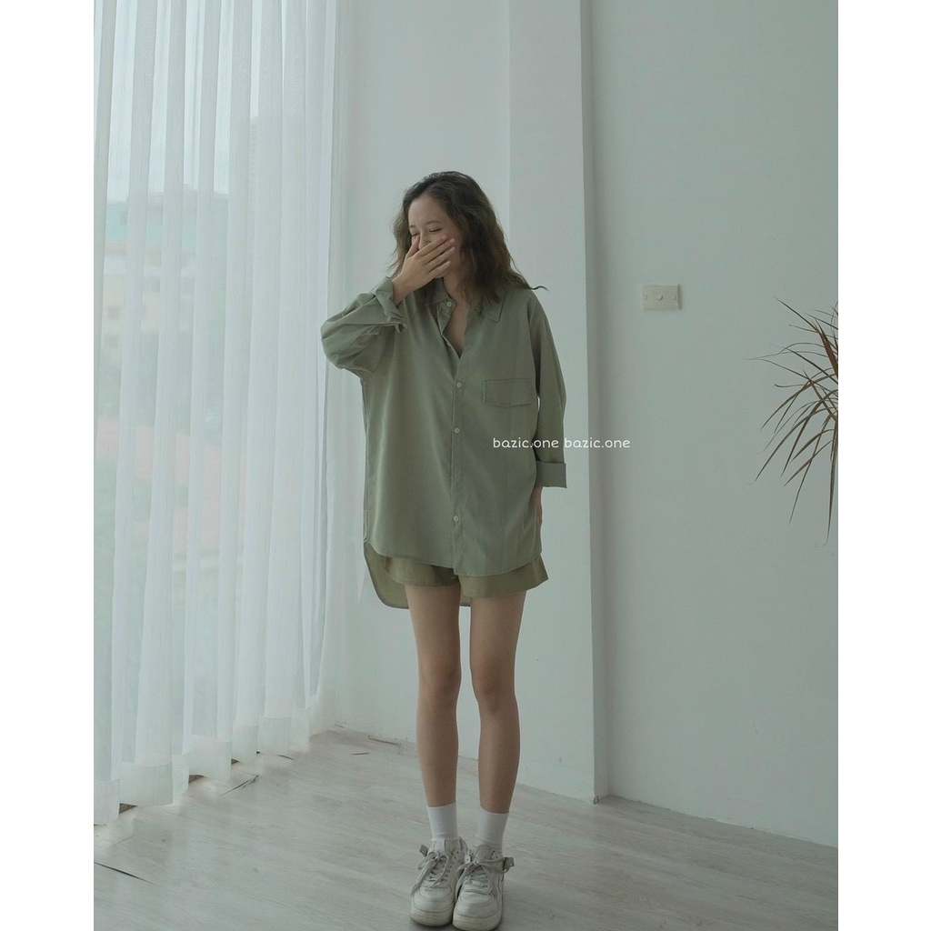 áo sơ mi nư dài tay  túi ngực ,vạt bầu , phối  khuy sau cổ