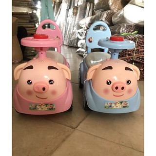 [Freeship] Xe lắc bơi chòi chân hình con heo có nhạc + còi + tựa lưng + thùng đồ